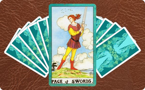 Rider Waite depiction of the Page of Swords tarot card on top of a spread of other cards.