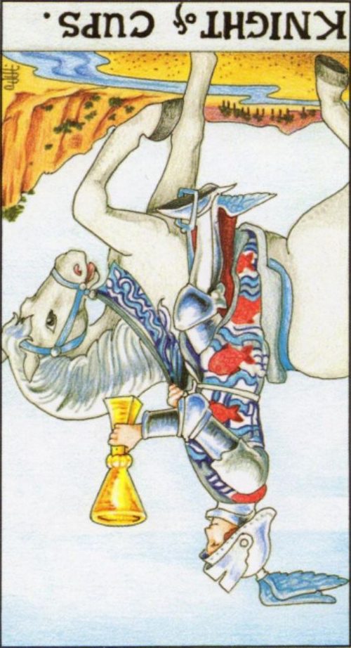 Rider Waite depiction of the Knight of Cups tarot card reversed