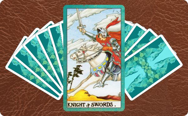 Rider Waite depiction of the Knight of Swords tarot card on top of a spread of other cards.