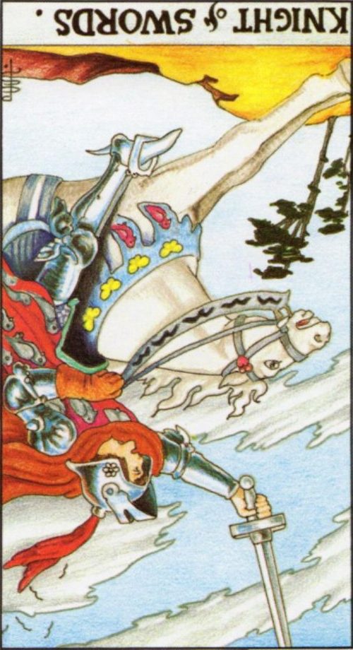 Rider Waite depiction of the Knight of Swords tarot card reversed.