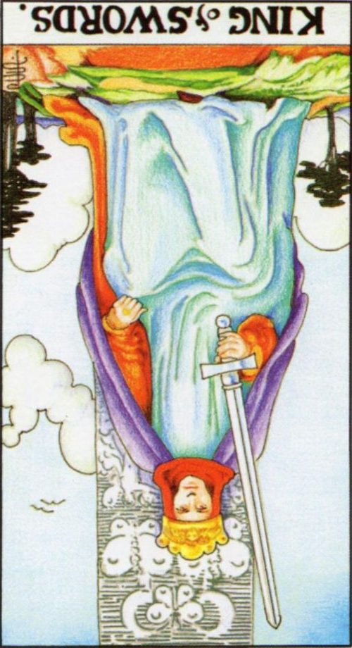 Rider Waite depiction of the King of Swords tarot card reversed.