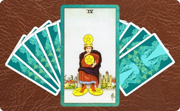 Rider Waite depiction of the Four of Pentacles tarot card sitting on top of a spread of other cards.