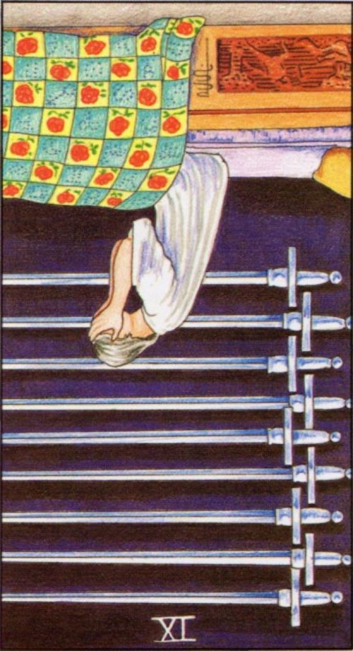 Rider Waite depiction of the Nine of Swords tarot card reversed.